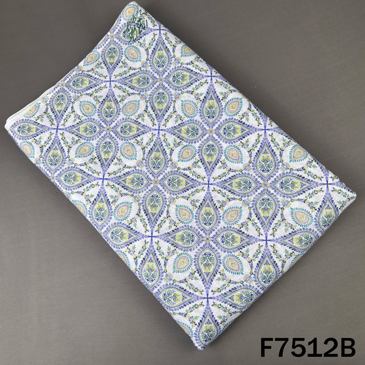 Blue green linen cotton fabric with paisley print