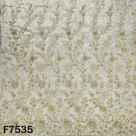 Ivory designer tissue fabric with floral vine embroidery