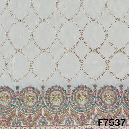Ivory designer crepe fabric with ornamental embroidered border