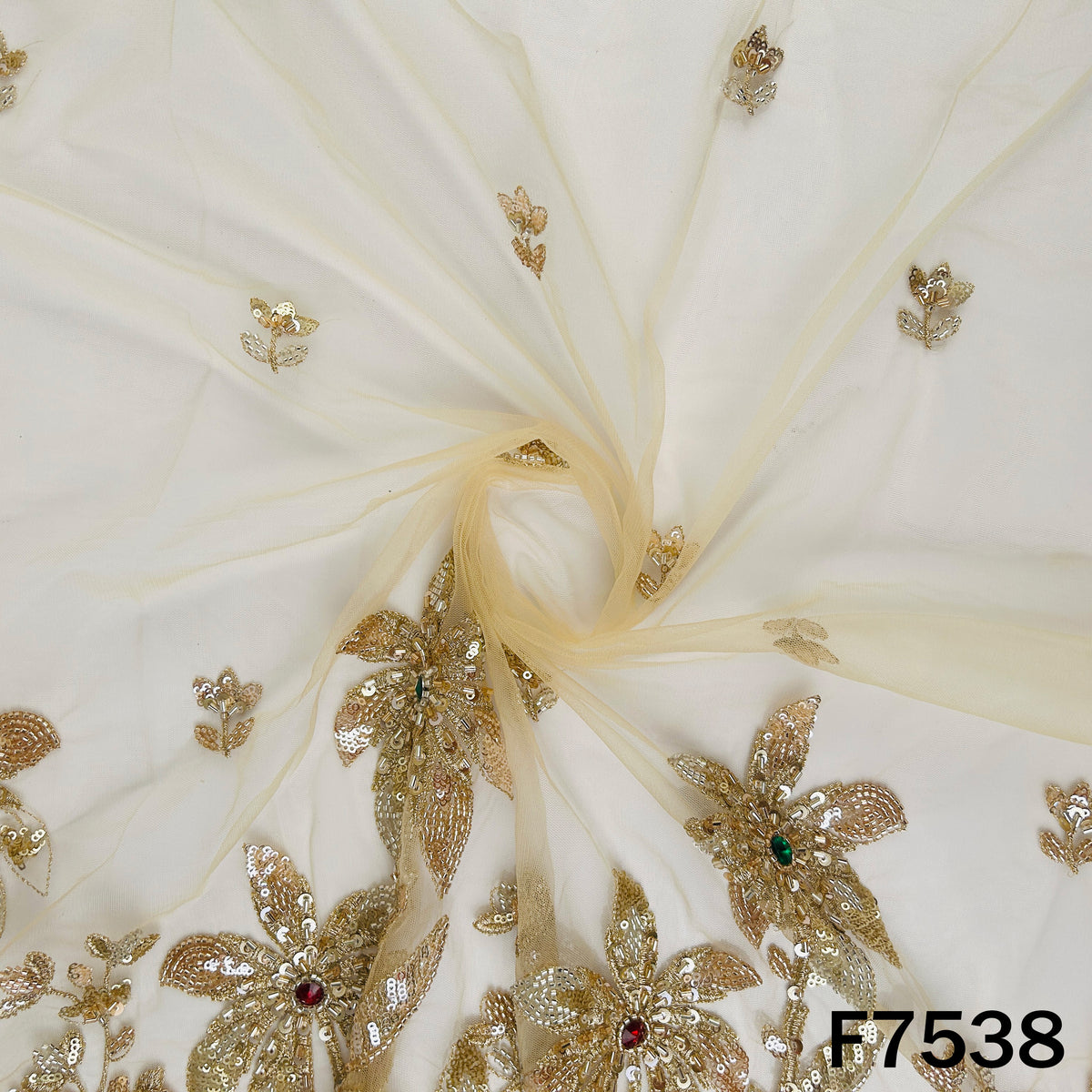 Ivory net fabric with scattered zari sequin motifs