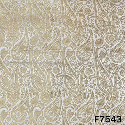 Dyeable brocade silk featuring intricate golden paisley weaving