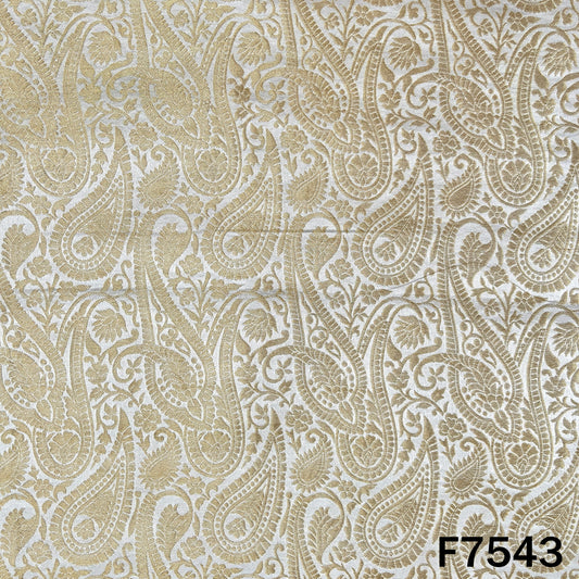 Dyeable brocade silk featuring intricate golden paisley weaving