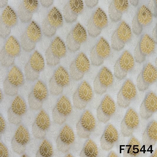 Dyeable georgette suit material featuring traditional gold motifs