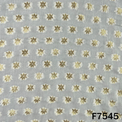 Dyeable georgette suit material featuring golden floral motifs