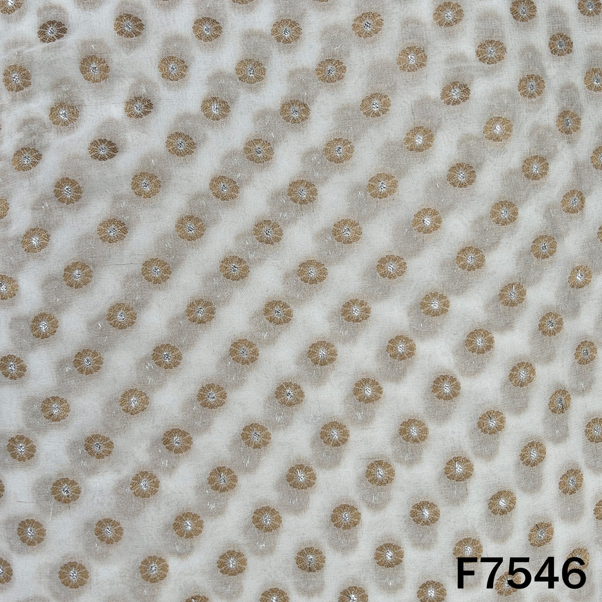Dyeable georgette fabric with circular golden zari motifs
