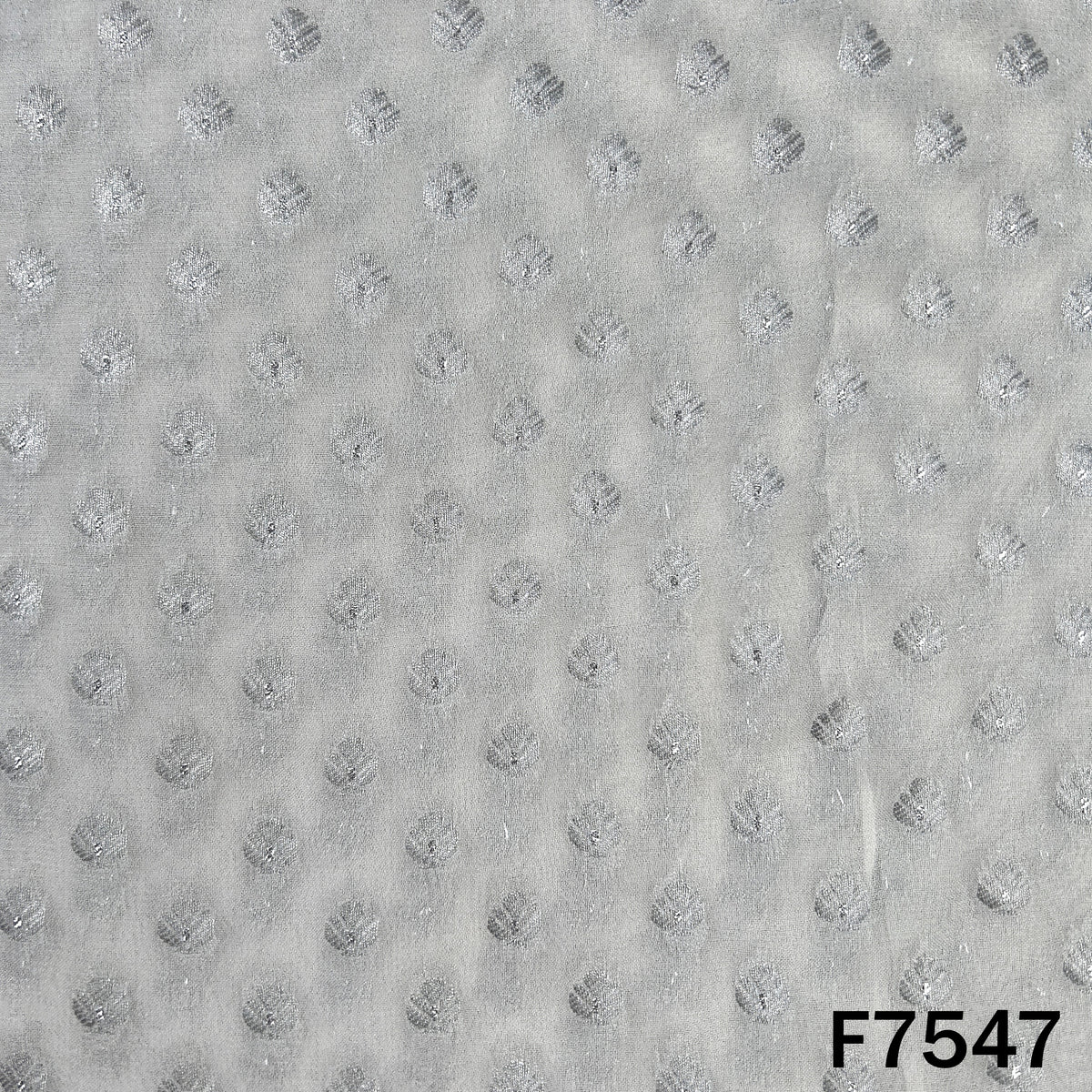 Dyeable georgette fabric with circular zari motifs