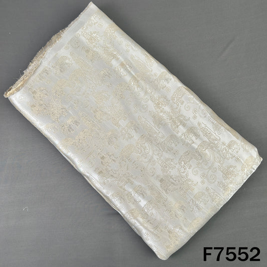 Ivory self jacquard tissue fabric with royal elephant motifs