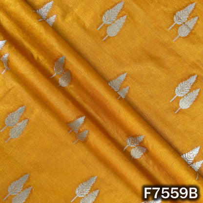 Mustard silk brocade draped with shimmering zari work