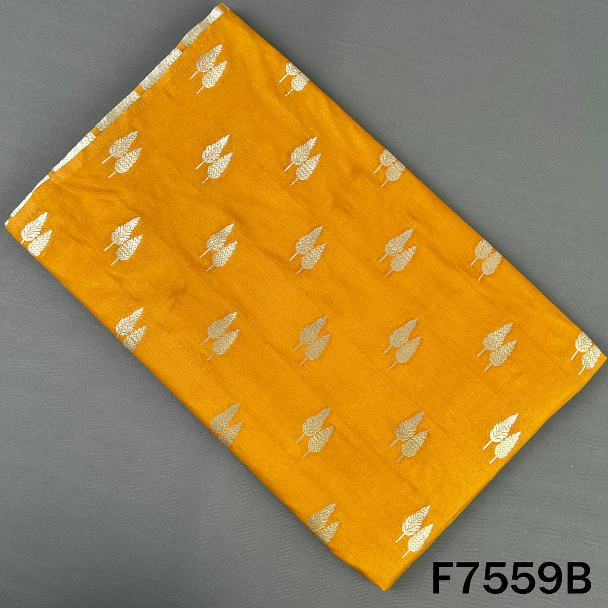 Mustard yellow brocade silk with woven silver motifs