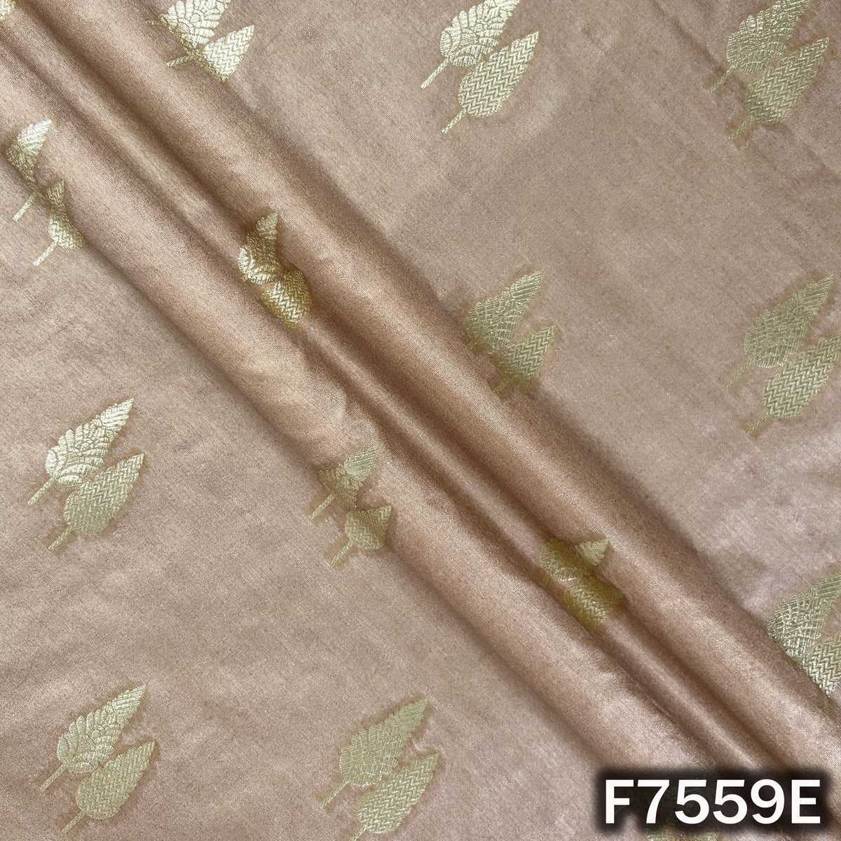 Soft beige brocade silk with traditional woven leafwork