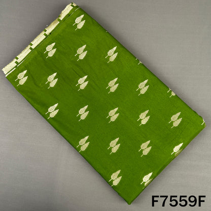 Green brocade silk fabric featuring silver zari leaves