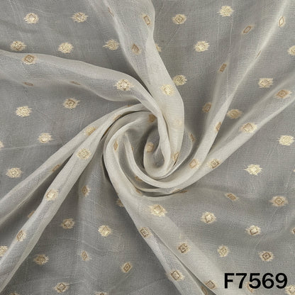 Sheer ivory jute silk with scattered golden butis
