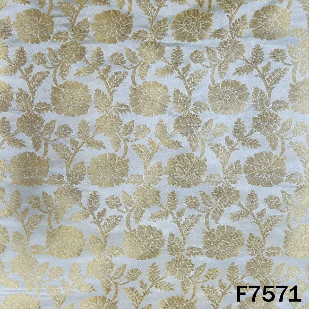 Dyeable brocade silk featuring intricate gold leafy motifs