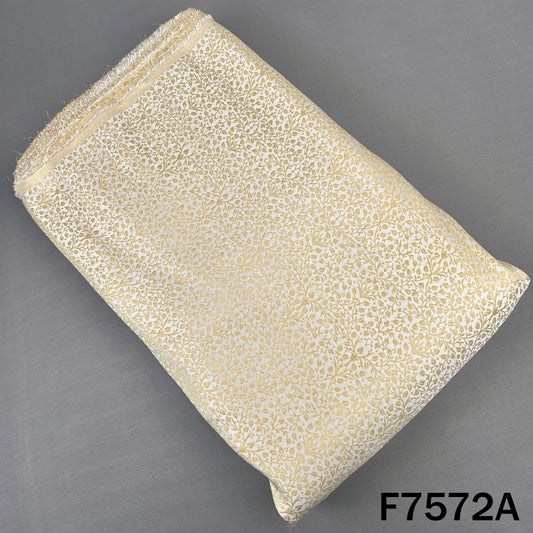 Golden brocade silk fabric featuring intricate floral vines