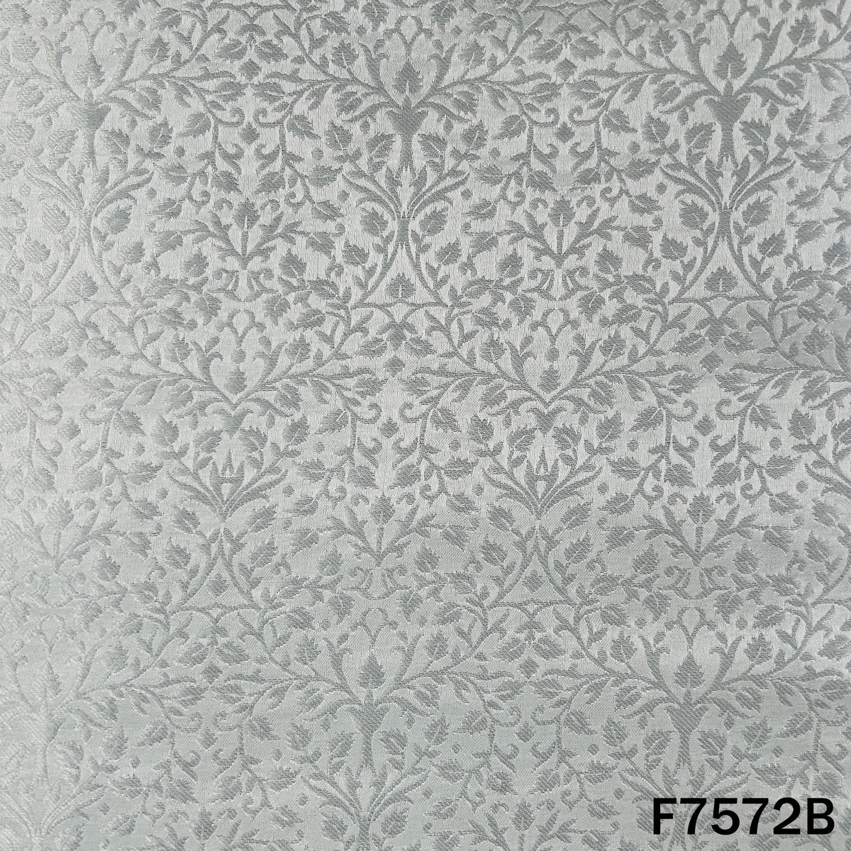 White silver brocade suit material with zari vines