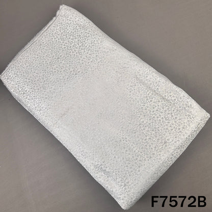 Silver brocade silk fabric with delicate floral pattern