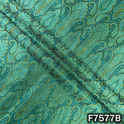 Draped turquoise green brocade with woven paisley pattern