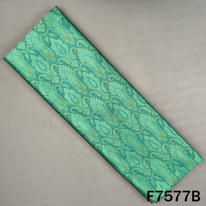Turquoise green brocade fabric with paisley jacquard motifs