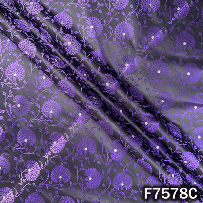 Draped purple designer brocade with woven floral vines