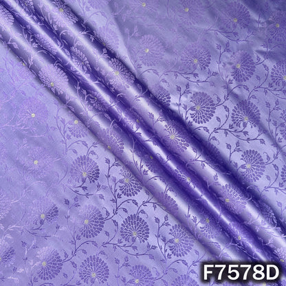 Draped lavender brocade fabric with subtle woven florals