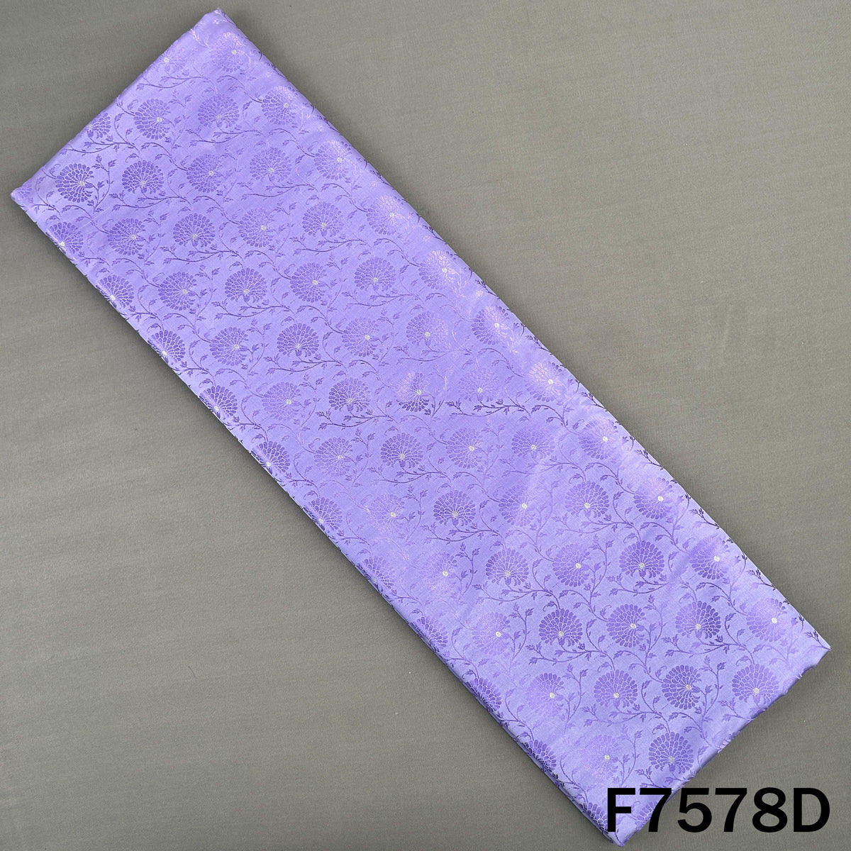 Lavender brocade fabric featuring delicate floral jacquard work