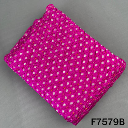 Magenta Bandhani silk fabric with traditional golden motifs