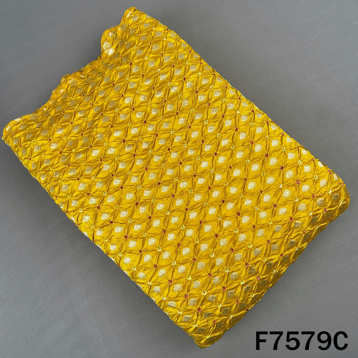 Yellow Pure Bandhani silk fabric with golden butis