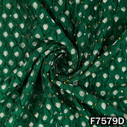 Draped green Bandhani silk with woven golden motifs