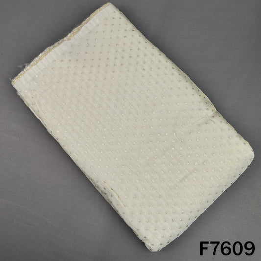 Ivory shimmer tissue fabric with delicate golden zari butti work