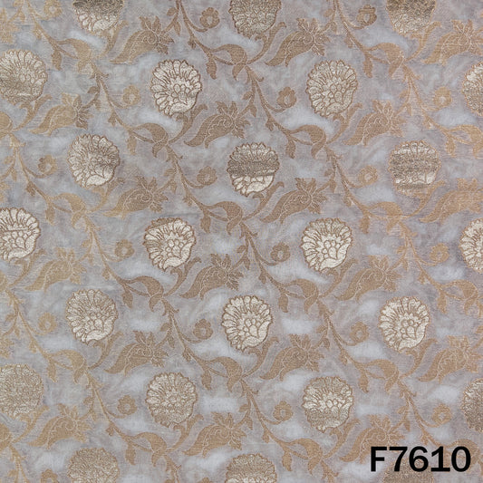 Dyeable georgette fabric with intricate golden floral and leafy vine motifs