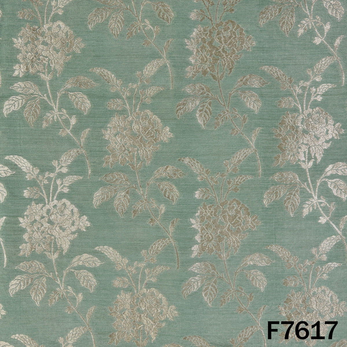Mint green Monga silk with intricate golden floral and leafy motifs