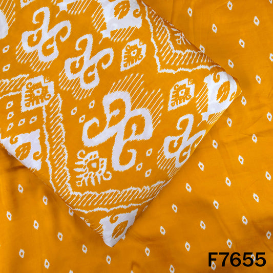 Mustard yellow modal satin fabric with white printed motifs