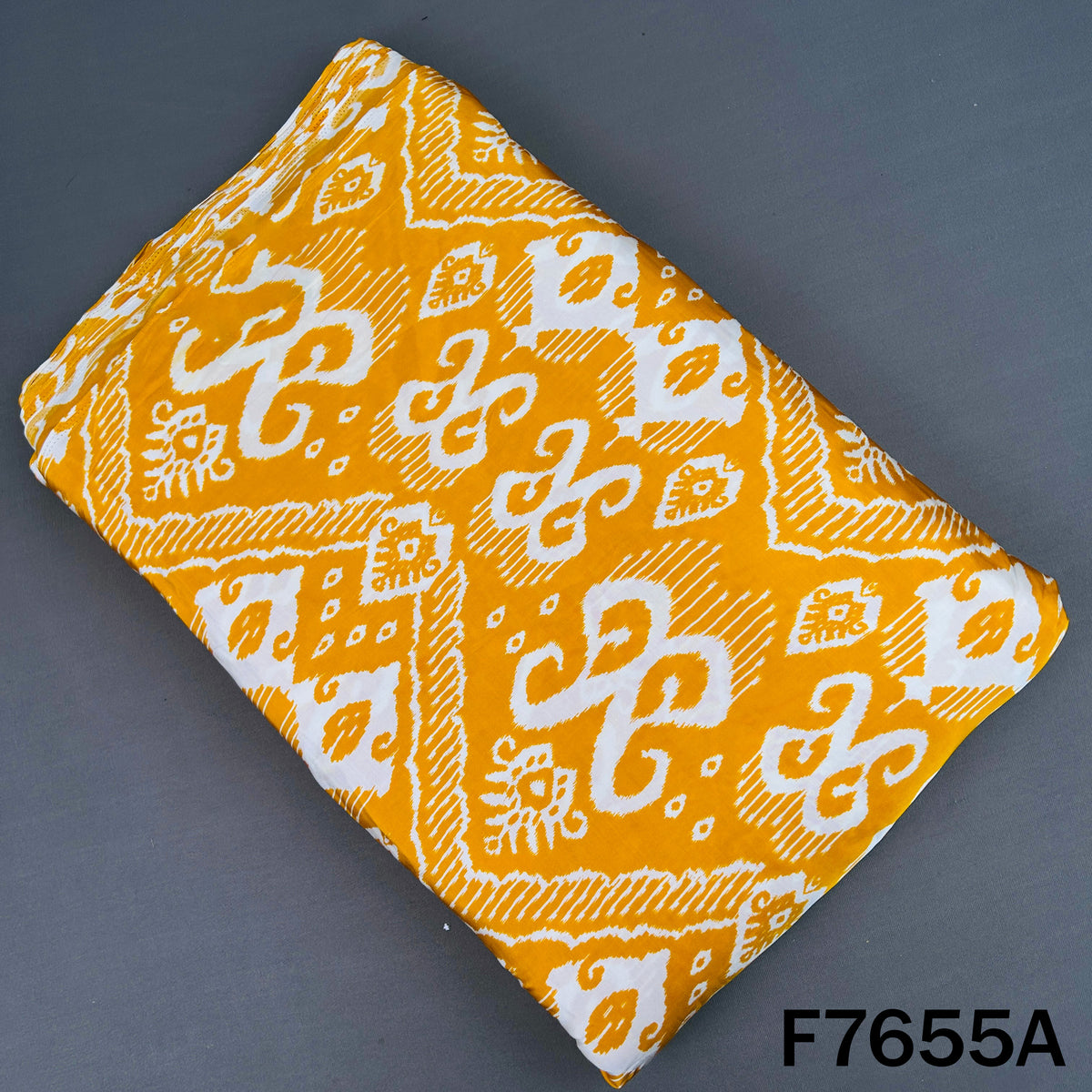 Mustard yellow modal satin top with white ethnic print