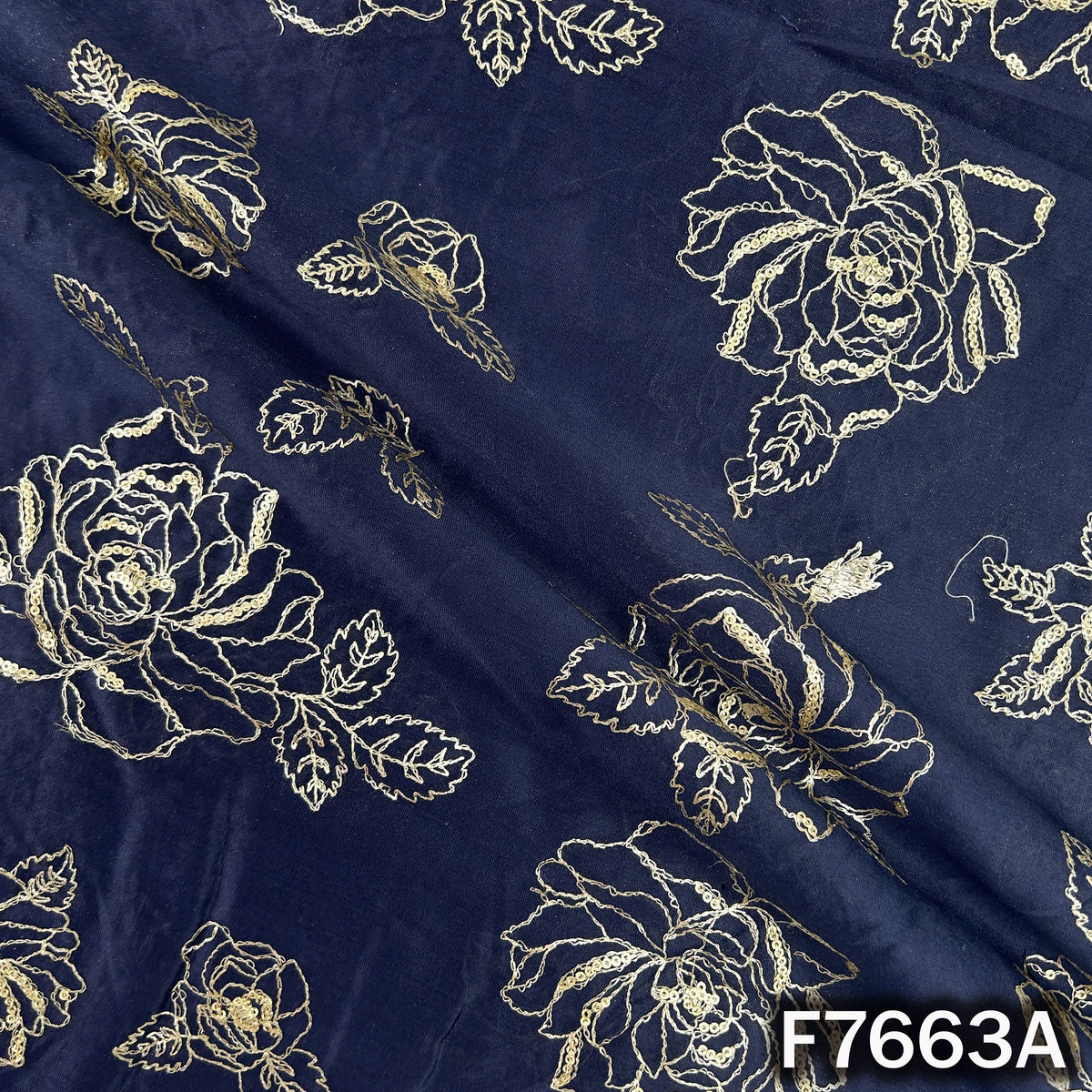 Draped navy blue Chanderi silk fabric with intricate rose embroidery
