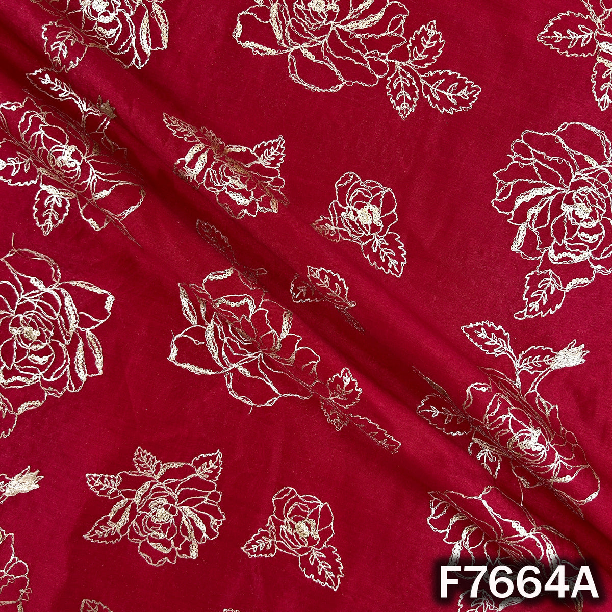 Draped maroon Chanderi silk fabric with intricate rose embroidery