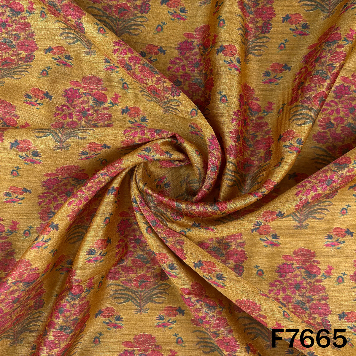 Draped mustard yellow Pure Monga silk fabric with colorful floral motifs