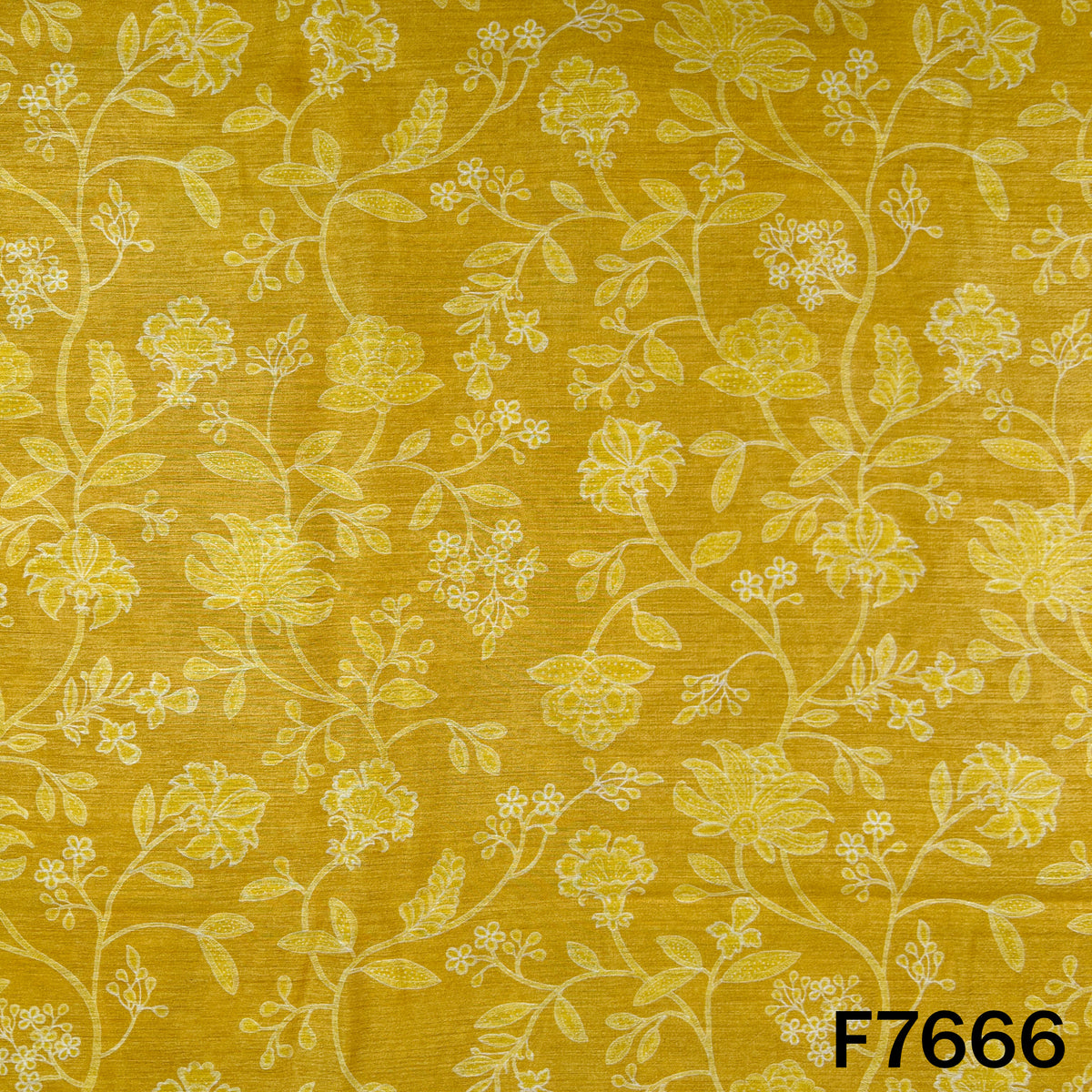 Yellow Monga silk fabric with intricate ivory floral and leafy motifs