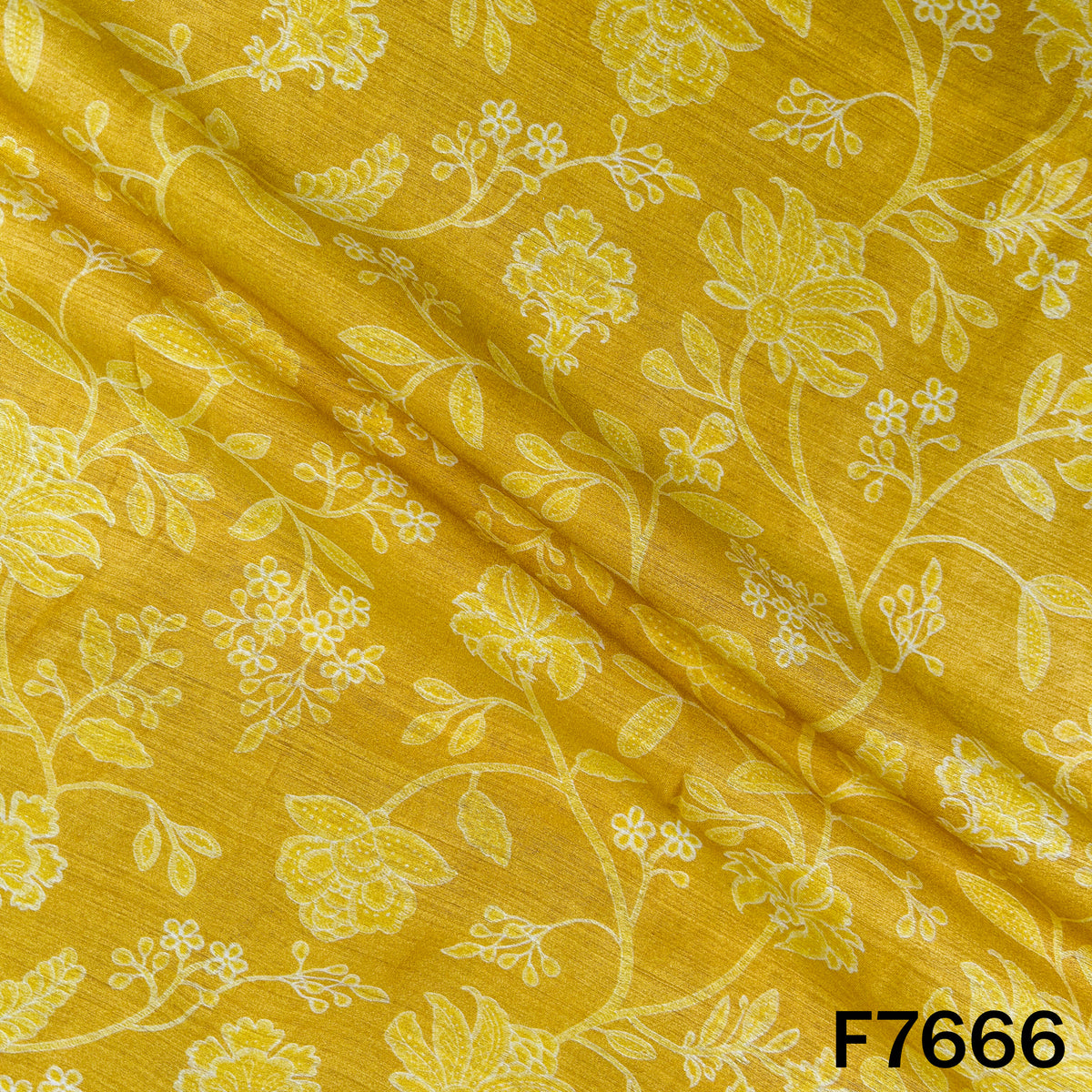 Draped mustard yellow Pure Monga silk fabric with elegant floral vine print