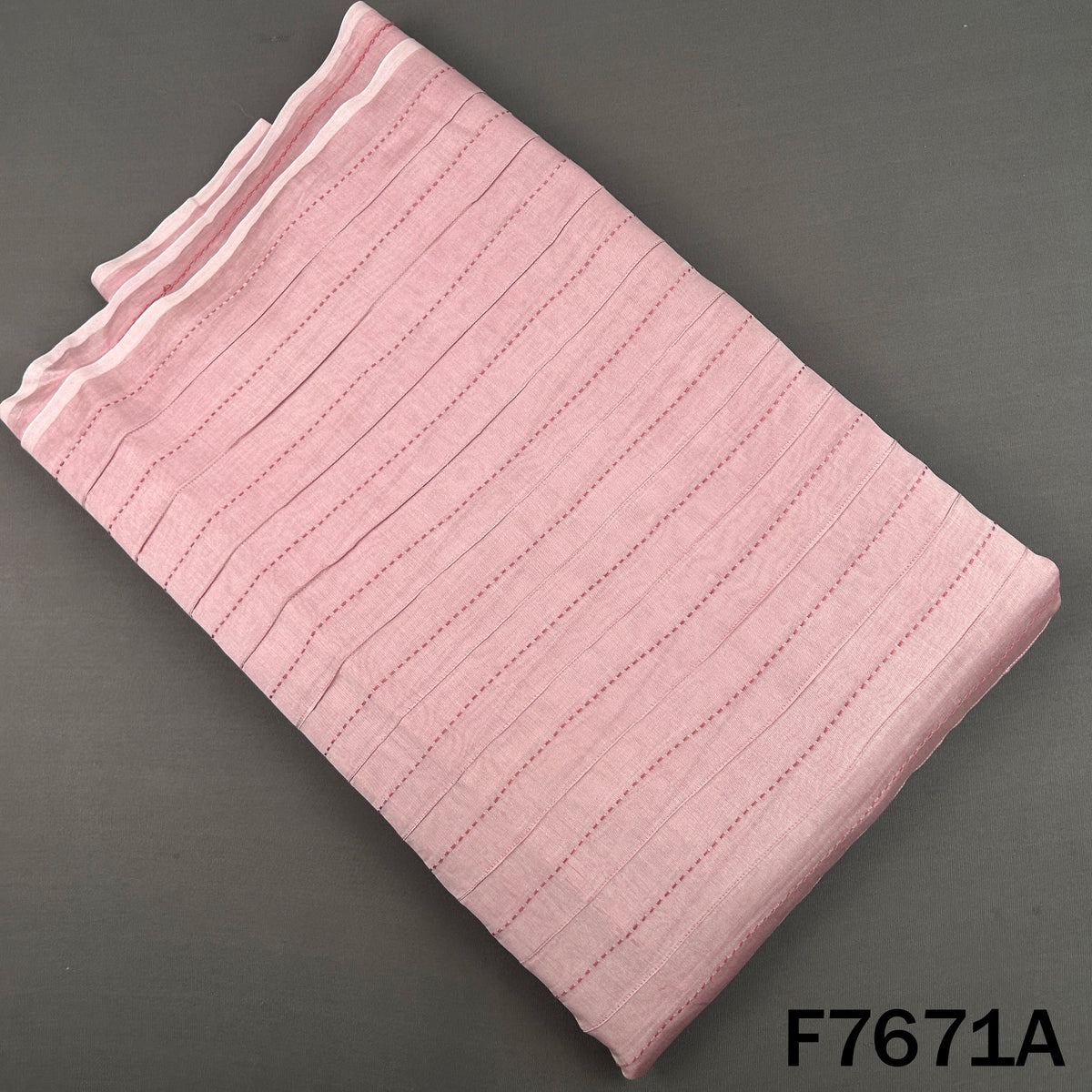 Pink Monga silk fabric with delicate linear threadwork