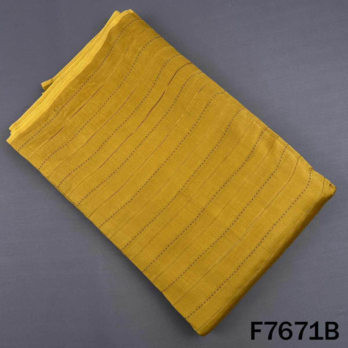 Mustard yellow Monga silk fabric with linear embroidery