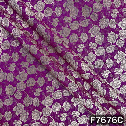 Draped purple brocade fabric with floral zari weaving