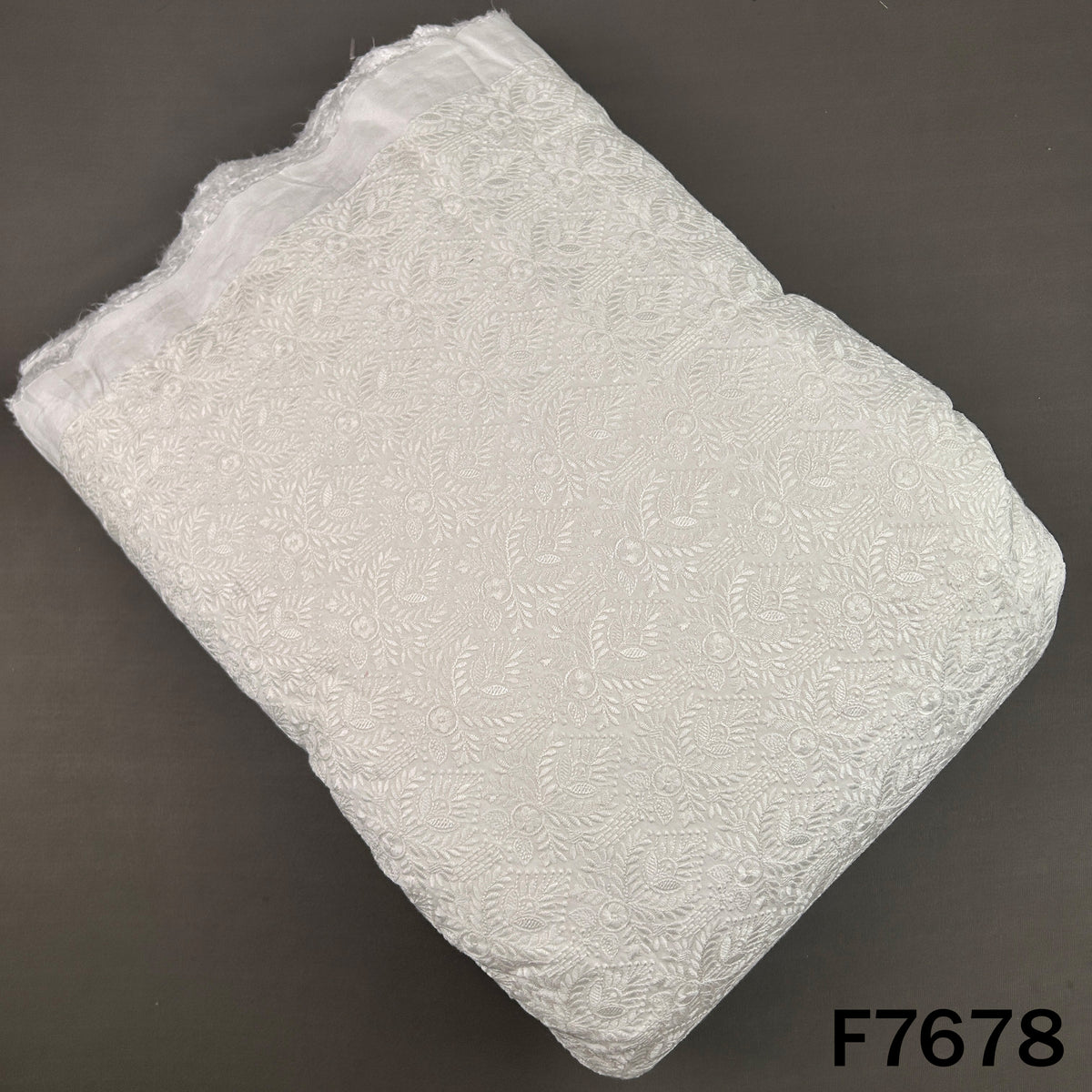 Ivory dyeable raw silk fabric with floral thread embroidery