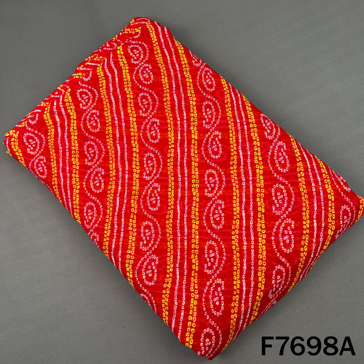 Red georgette fabric with traditional Bandhani patterns