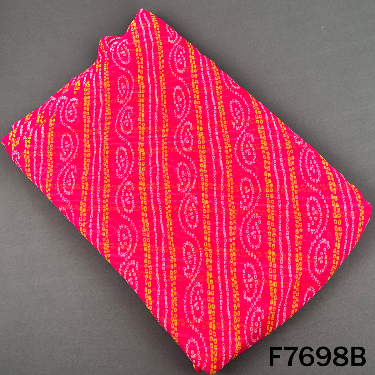 Rani pink georgette fabric with colorful Bandhani stripes