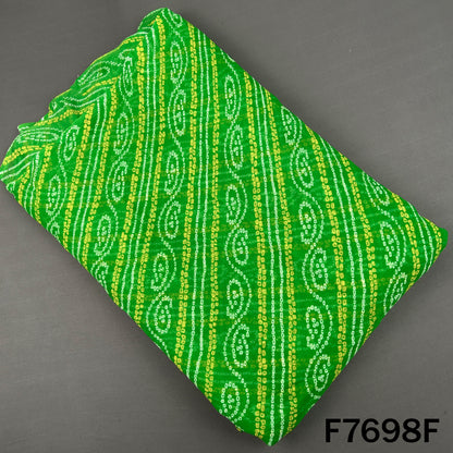 Bright green georgette fabric with yellow Bandhani patterns