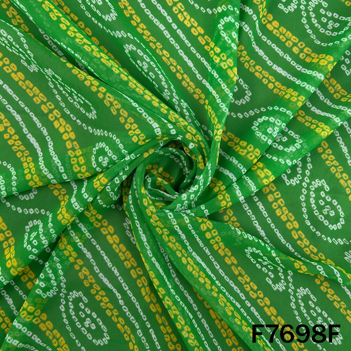 Draped bright green georgette with traditional paisley motifs
