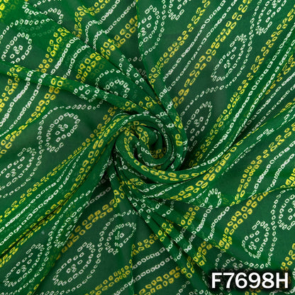 Draped dark green georgette with colorful Bandhani patterns