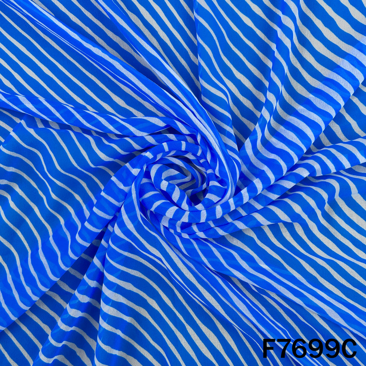 Draped royal blue georgette with traditional wave stripes