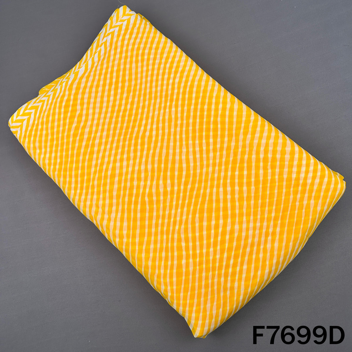Yellow georgette fabric with classic white Laheriya stripes