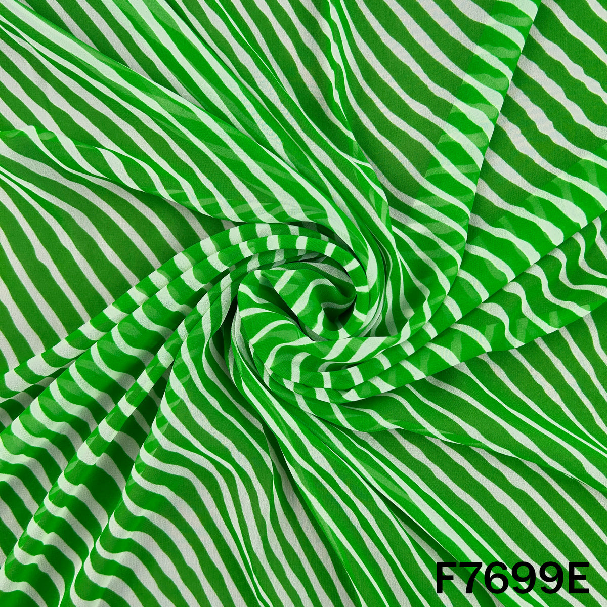 Draped green Laheriya georgette with traditional wave pattern